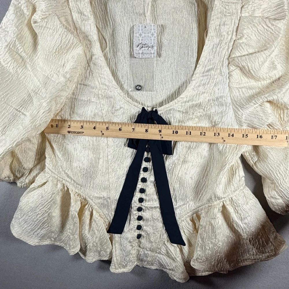 Free People NWT Ivory Textured Puff Sleeve Peplum Top Black Tie Bow Size P